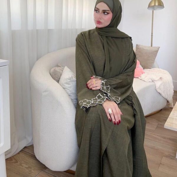 Elegant Arabic hijab in soft fabric, featuring intricate patterns, representing modest Islamic fashion and cultural heritage