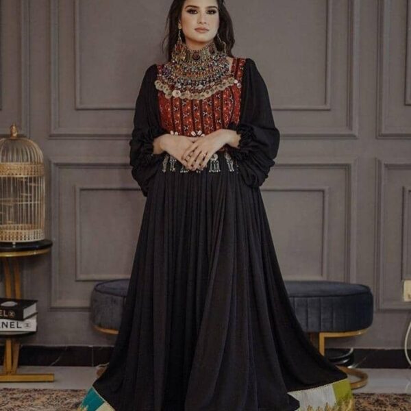 Afghani handmade dress by Zeenat Wears, showcasing unique cultural style and intricate traditional craftsmanship, perfect for elegant occasions.